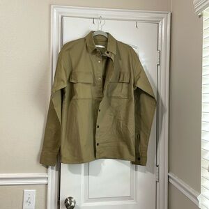 A man’s golden medium, long sleeve shirt